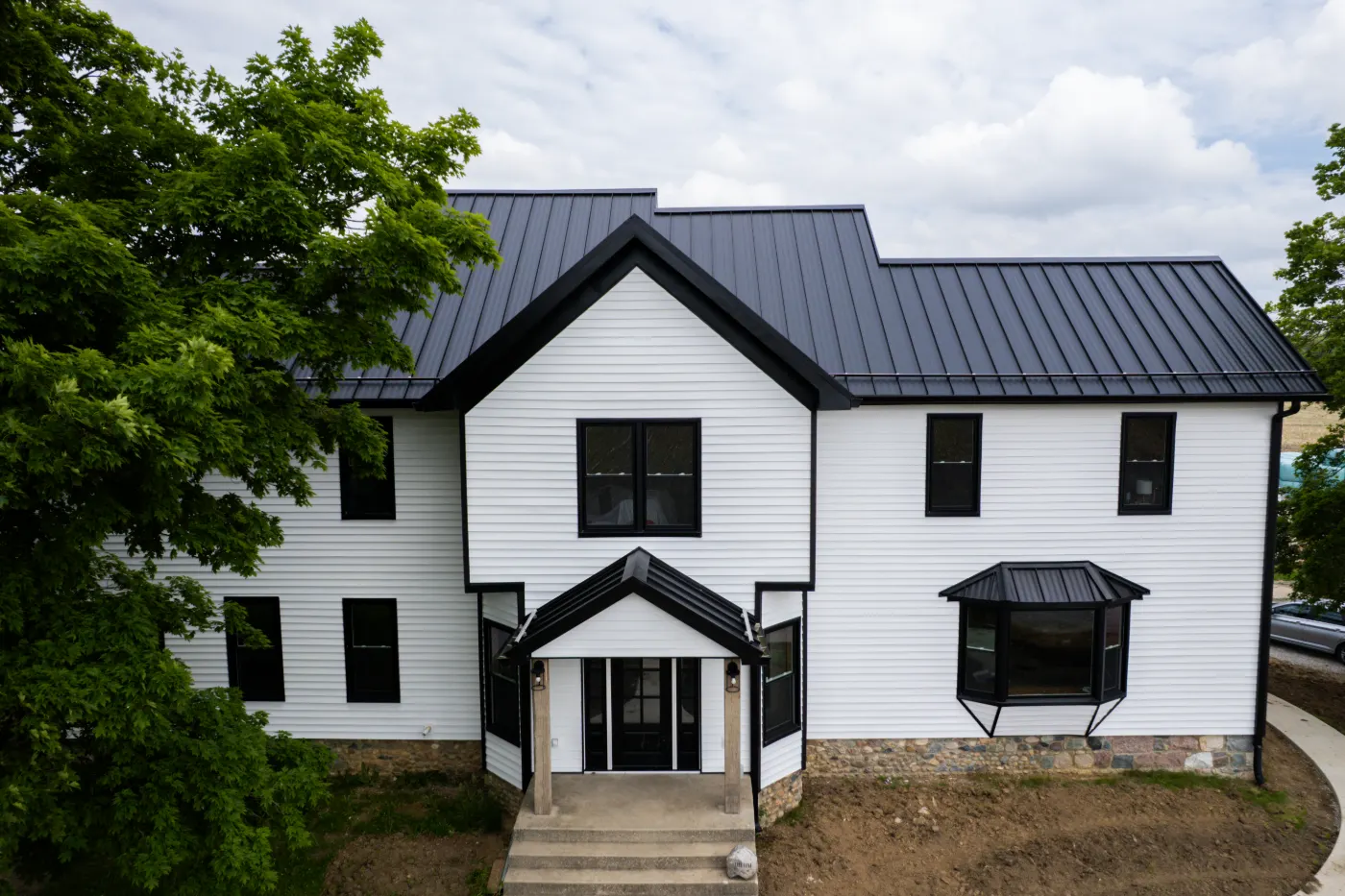 Tarping and dry-in on a Williams Glen commercial roof